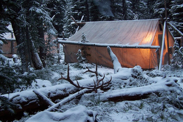 Hunting camp in the snow.
