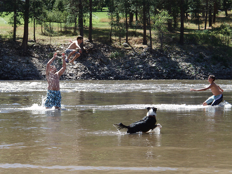 Playing in the river is a family favorite during the warm summer days at Shepp Ranch.