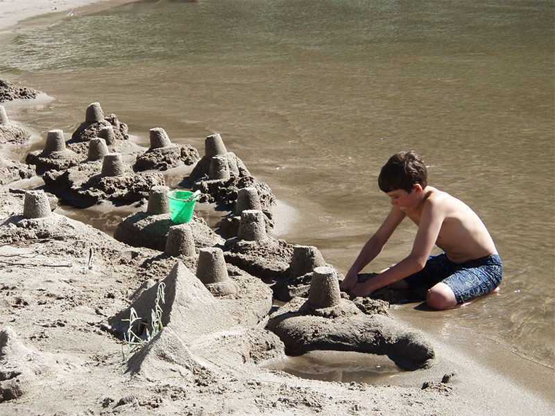 The beach of the Salmon River makes an excellent playground in the summer.
